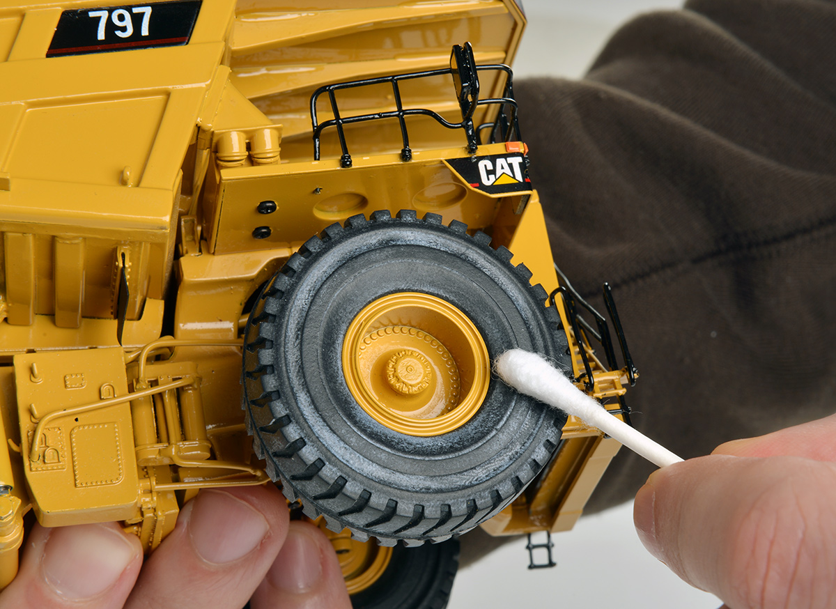 Using a cotton swab, we applied a thin layer of silicone oil to the tires.